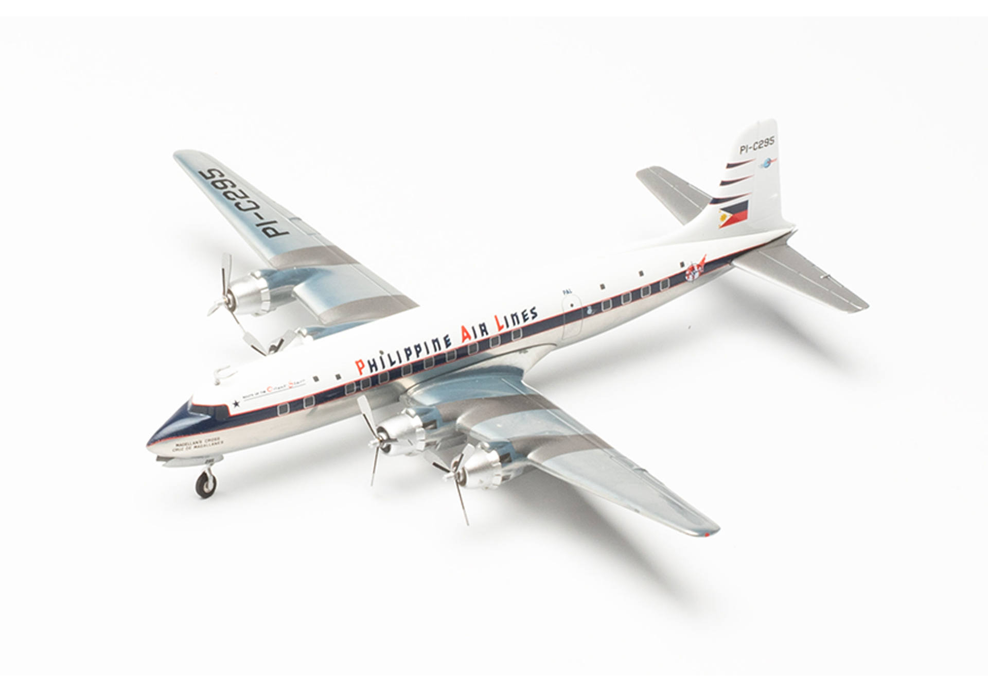 Herpa 572545 Philippine Air Lines Douglas DC-6B - PI-C295 “Magellan’s Cross / Cruz de Magallanes” 1:200