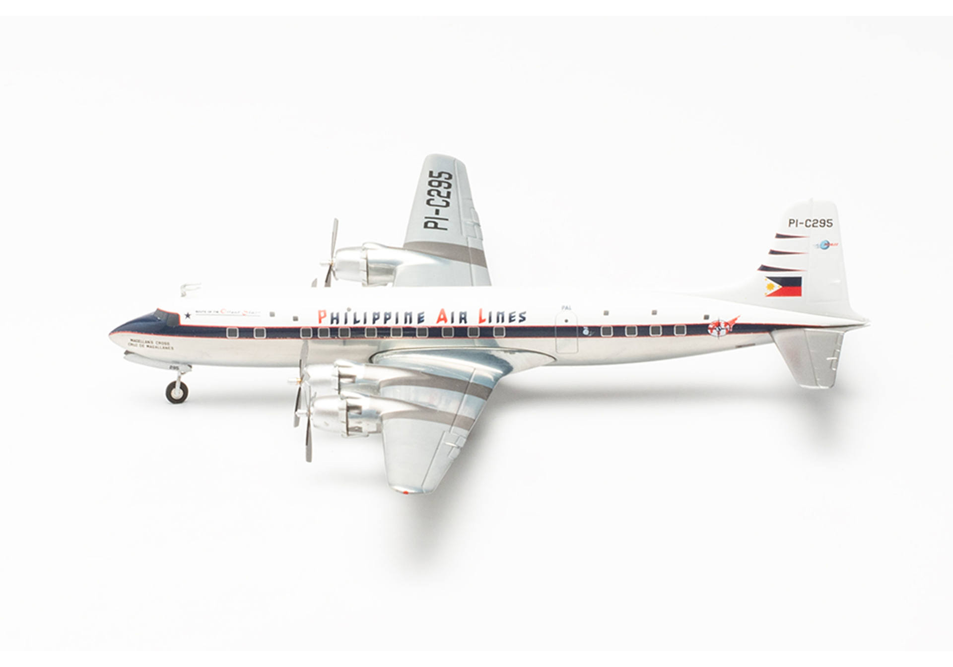 Herpa 572545 Philippine Air Lines Douglas DC-6B - PI-C295 “Magellan’s Cross / Cruz de Magallanes” 1:200