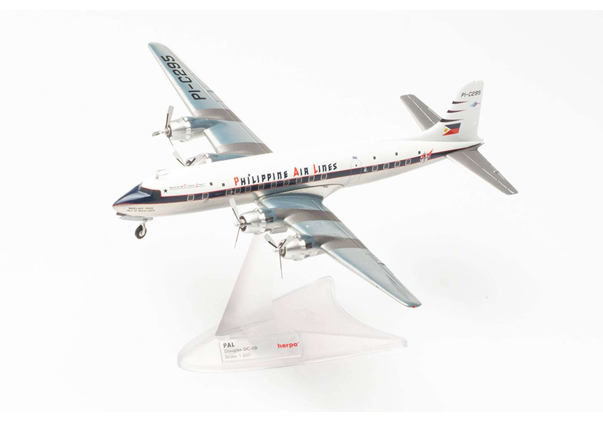 Herpa 572545 Philippine Air Lines Douglas DC-6B - PI-C295 “Magellan’s Cross / Cruz de Magallanes” 1:200